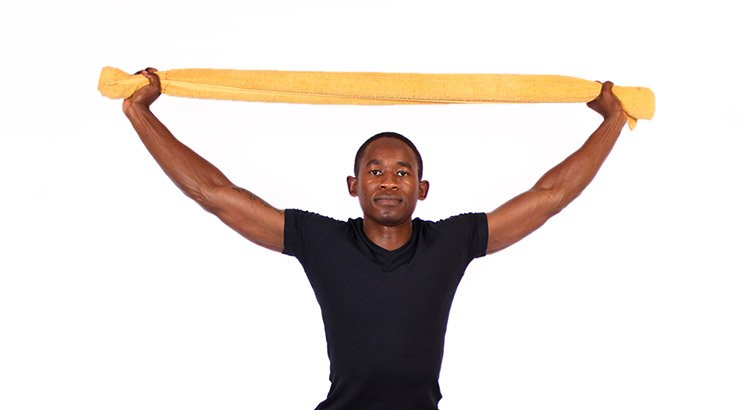 10 Best Exercises for A Stiff Upper Back 5 upper back towel stretch