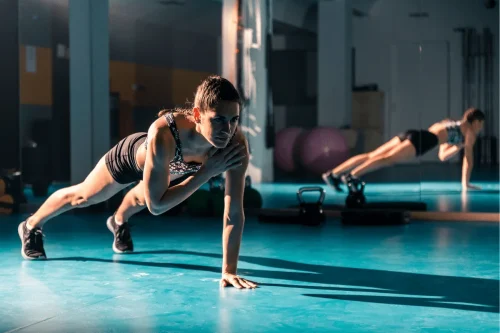 Blog 6 BENEFITS OF DOING PLANK SHOULDER TAPS
