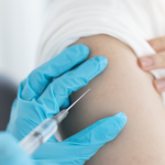 Person experiencing fatigue and fever after mpox vaccination | Monkeypox vaccine side effects