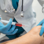 a doctor push prp injection and you neet to know PRP Injection Side Effects: 10 Risks Most People Ignore