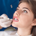 Patient undergoing dental scaling and polishing; understanding common teeth scaling side effects and recovery.