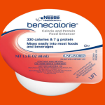 A caregiver in Nashville checking benecalorie side effects before adding the supplement to a meal.
