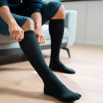 A person in Phoenix checking for side effects of wearing compression stockings and skin irritation from hosiery.